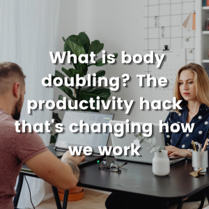 a man and a woman sat across a desk both working oin laptops in a while office with a plant and book case in the back ground with text what is body doubling? the productivityu hack thats changing how we work