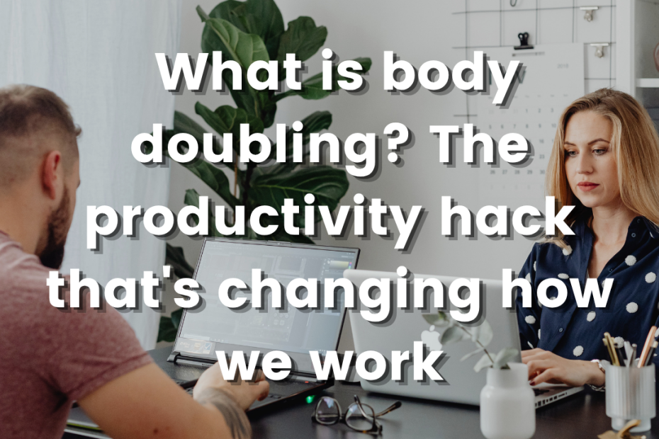 a man and a woman sat across a desk both working oin laptops in a while office with a plant and book case in the back ground with text what is body doubling? the productivityu hack thats changing how we work